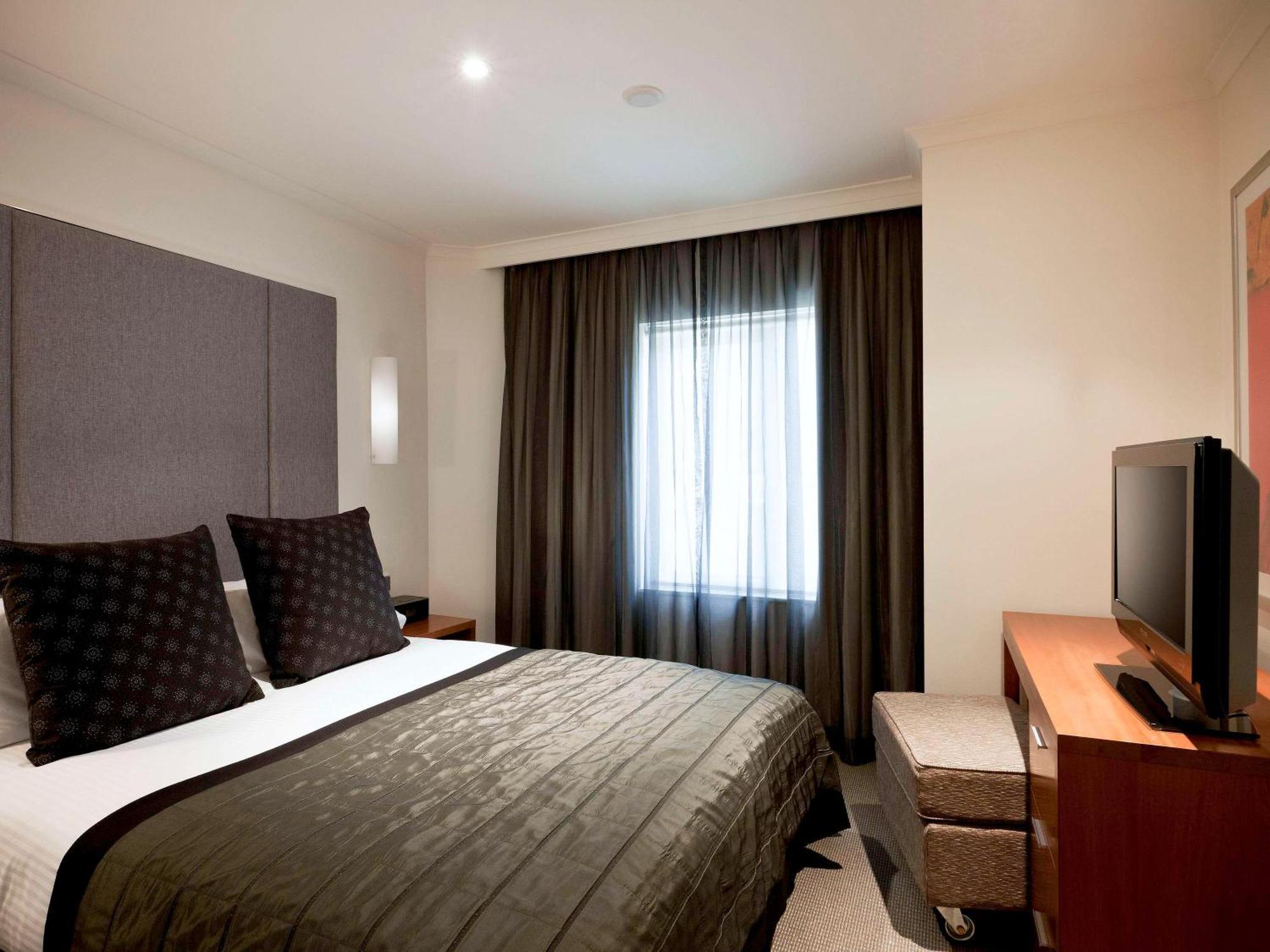 The Sebel Quay West Suites Sidney Exterior foto A bedroom at the hotel